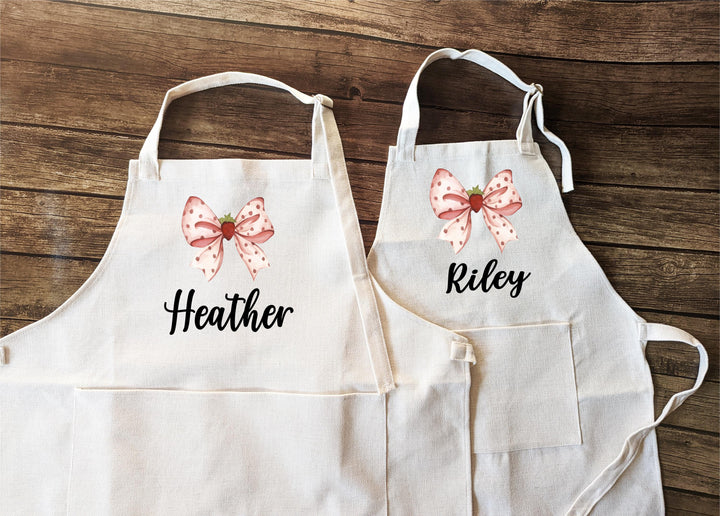 Personalized Strawberry Bow Apron with Name | Custom Cooking &amp; Baking Gift for Nana, Kids, Birthday or Mother’s Day Grandma and Me Aprons