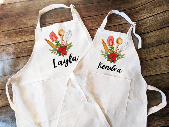 Personalized Christmas Apron – Custom Name Holiday Baking Apron with Poinsettia Design, Family Matching Aprons, Festive Kitchen Gift
