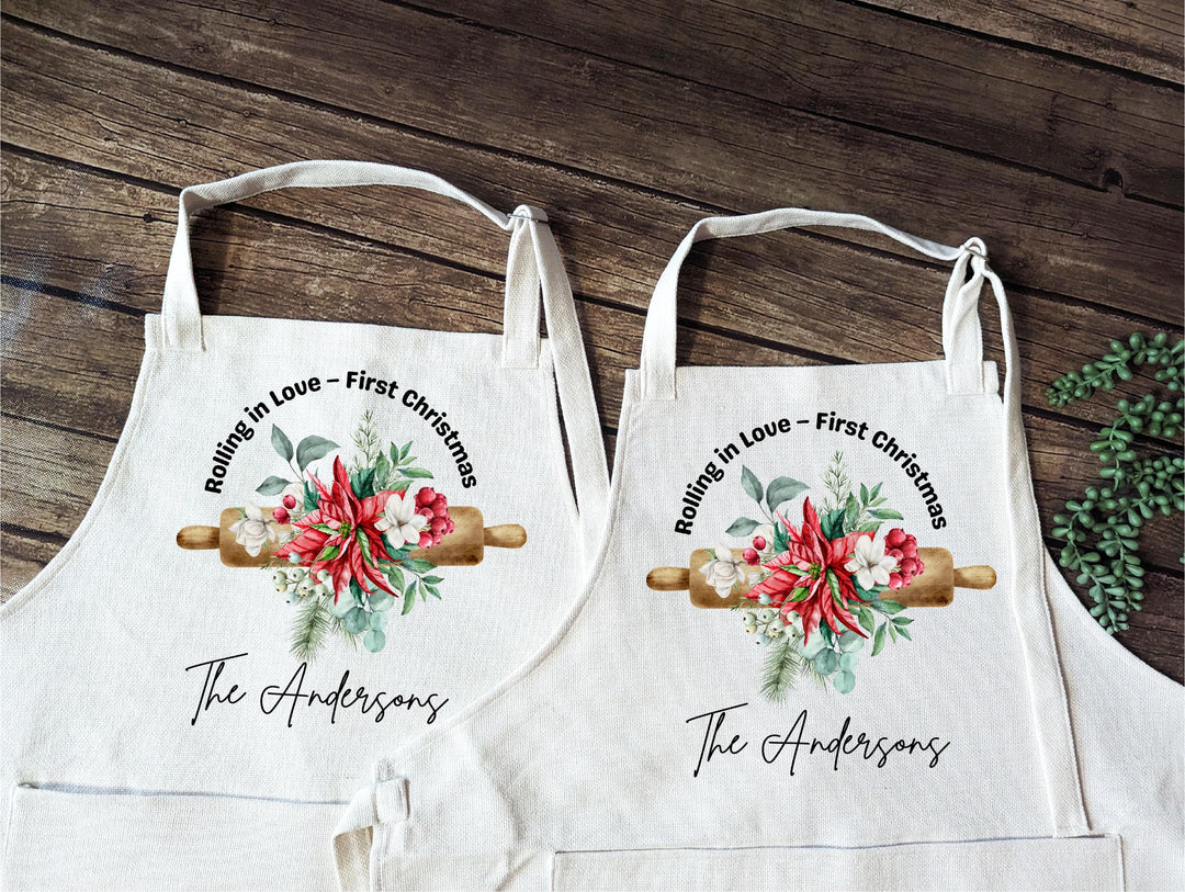 Personalized Couple Christmas Apron Set – “Rolling in Love” First Christmas Aprons with Floral Rolling Pin Design, Newlywed Baking Gift